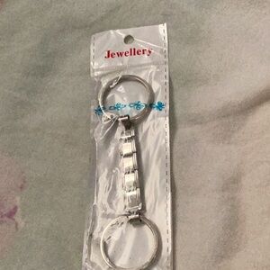 Elegant Silver Keychain with Blue Detail